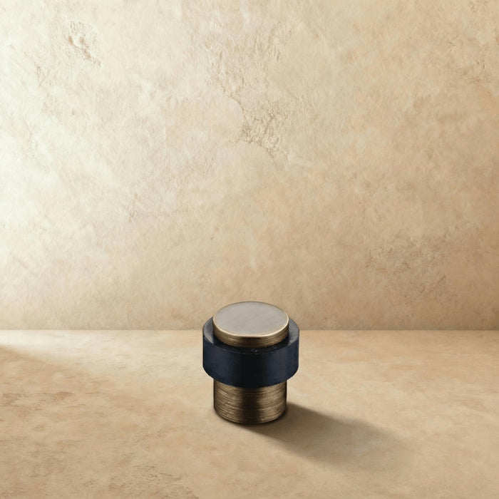 Vintage Brass Rubber Door Stop Stepped Cylinder Detail